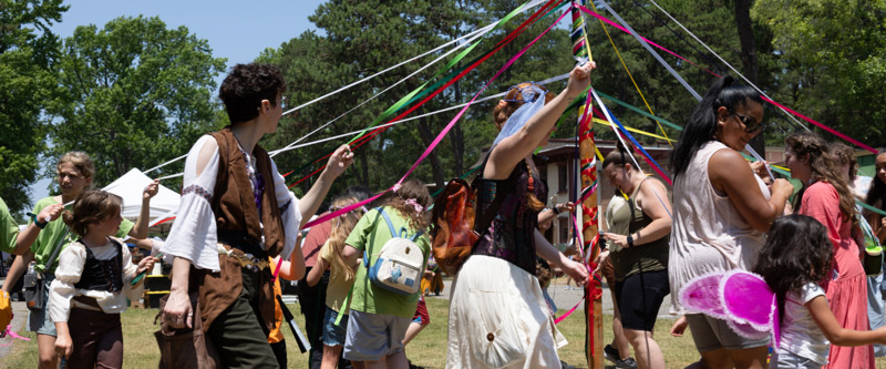 Fantasy Faire Event Web Banner Image, Characters dressed as Kings, Queens, Knights and Nymphs