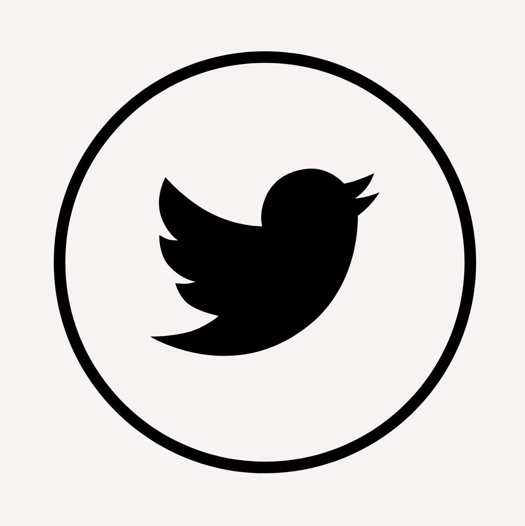 Image of the former Twitter bird logo in black and circled by a thin black circle.