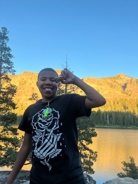 Youth Backcountry Camper Smiling and Smores