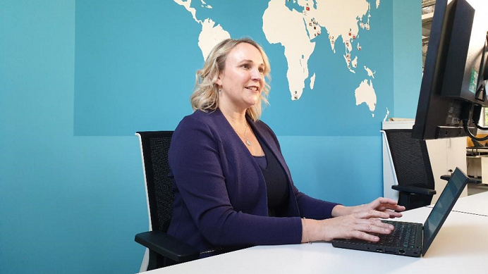 Picture of volunteer at desk