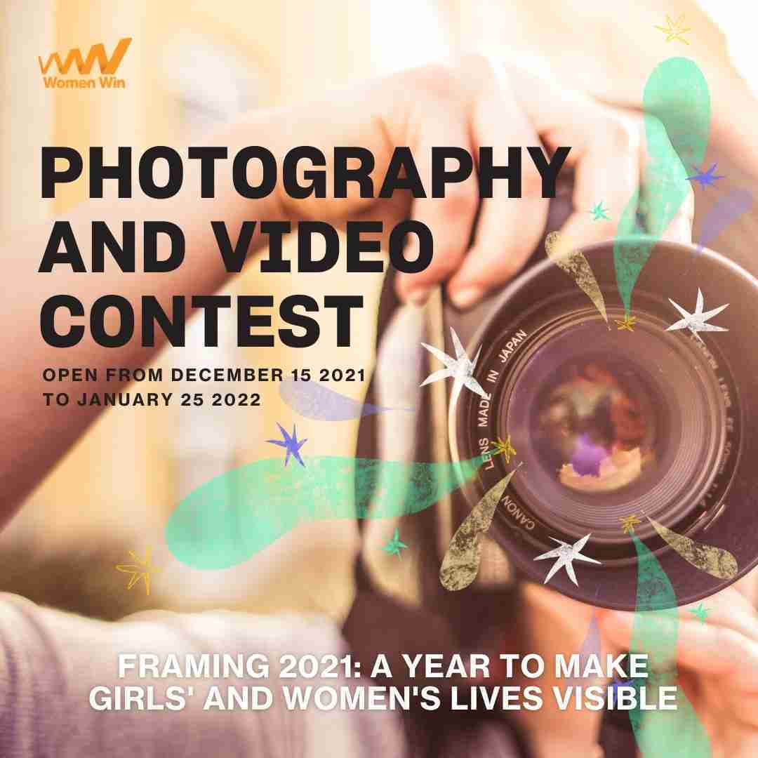 Women Win multimedia contest is open until January 25. Image of a women holding a camera edited with shapes and stars coming out of the lens
